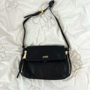 ON HOLD Aimee Kestenberg Bali black flap crossbody purse